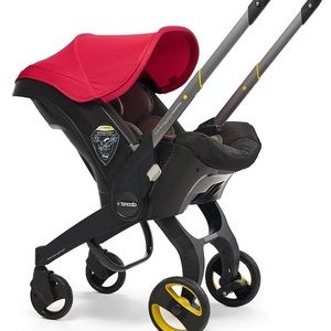 DOONA stroller MINT condition. Used twice! Red canopy.